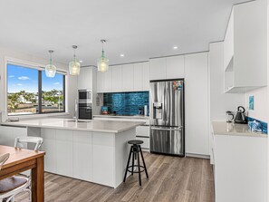 Fridge, microwave, dishwasher, cookware/dishes/utensils