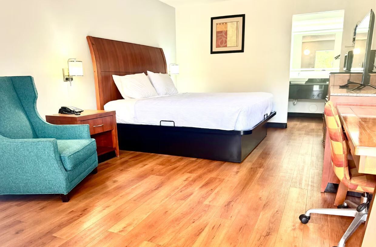 Blackout drapes, iron/ironing board, WiFi (free), bed sheets