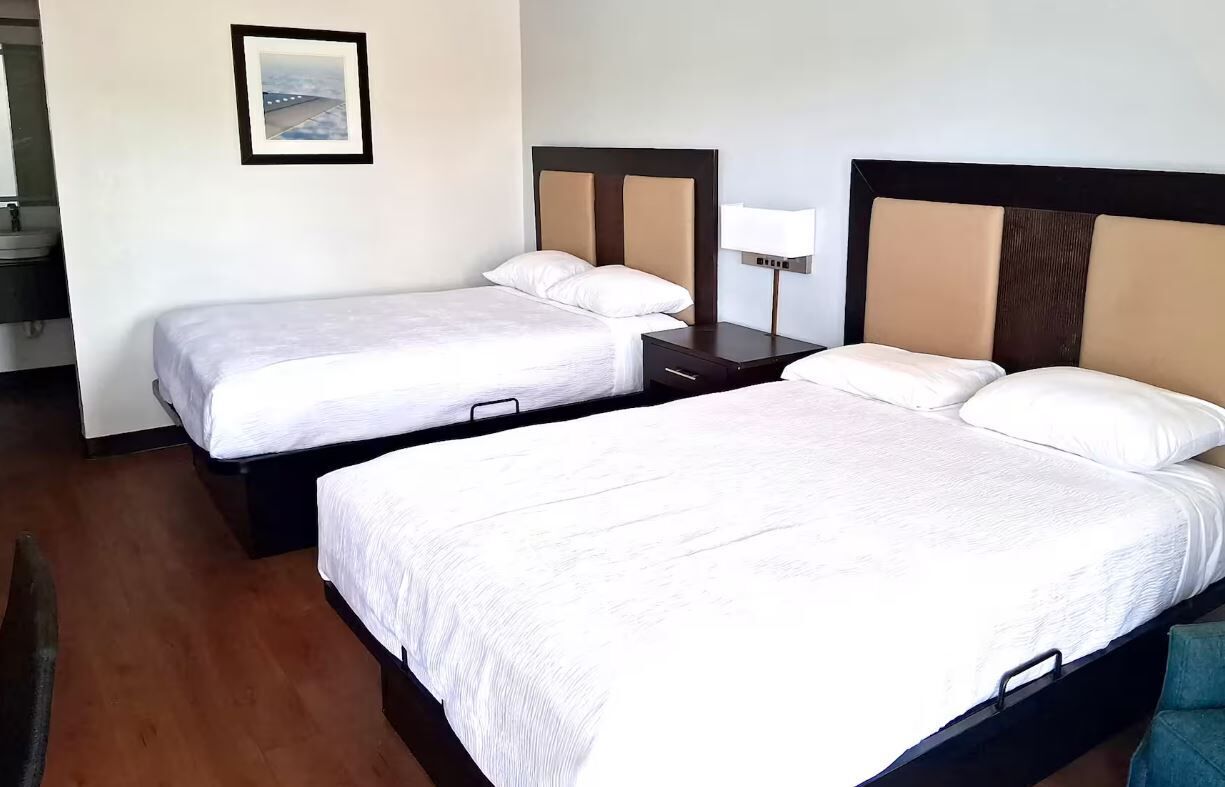 Blackout drapes, iron/ironing board, WiFi (free), bed sheets