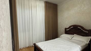 2 slaapkamers, een strijkplank/strijkijzer, gratis wifi