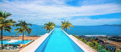 5 outdoor pools, pool umbrellas, sun loungers