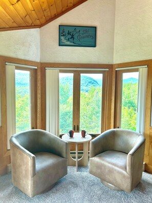 Smart TV, fireplace, foosball, books