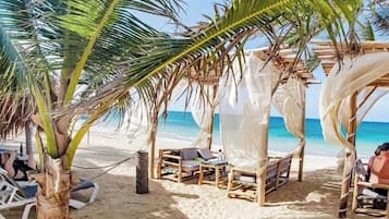 Private beach, white sand, free beach shuttle, beach bar