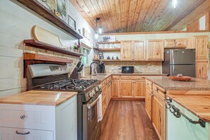 Fridge, stovetop, cookware/dishes/utensils