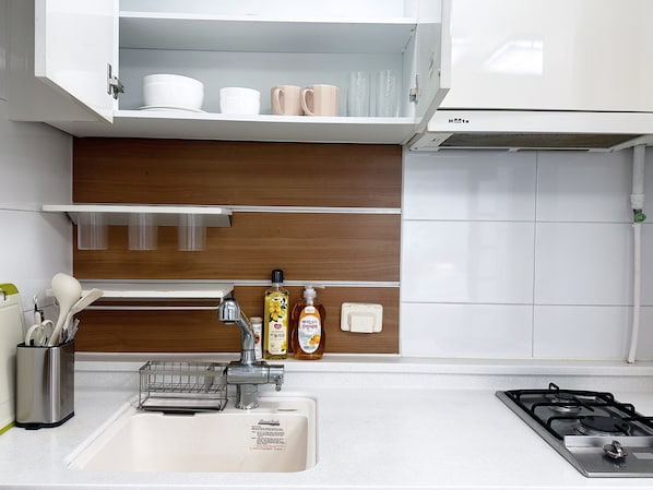 Fridge, electric kettle, toaster, cookware/dishes/utensils
