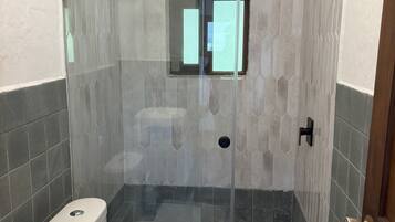 Shower, hair dryer, towels, soap