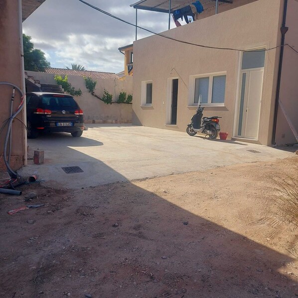 Room, 1 Bedroom | Parking | Limited parking - Charming Sant'antioco Yellow Apartment w (Sant'Antioco)