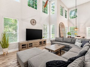Smart TV, fireplace, books, offices