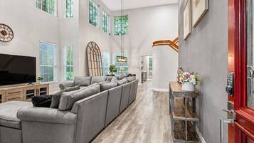 Smart TV, fireplace, books, offices