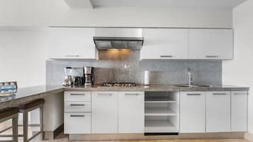 Full-sized fridge, microwave, stovetop, espresso maker