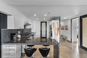 Club Apartment | Private kitchen | Full-size fridge, microwave, stovetop, espresso maker - Deck12 Casino and Resort by Monyxbnb (Puerto Vallarta)