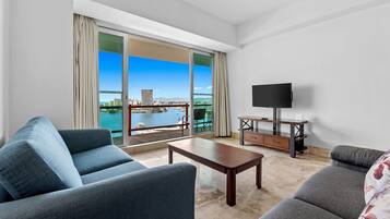 Romantic Apartment | Living area | 65-inch Smart TV with cable channels, offices