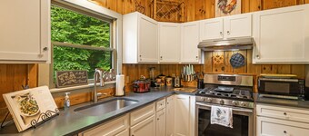 Golfing and Skiing Access From This Amazing Cabin on A Stream