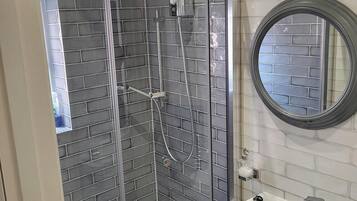 Shower, towels, toilet paper