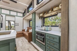 Private kitchen - Travel Trailer at the Water w Easy Access, Hot Tub, Grill, 2-Tier Deck (Corsicana)