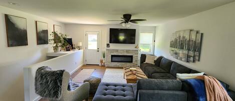 Smart TV, fireplace, DVD player, books