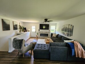 Smart TV, fireplace, DVD player, books