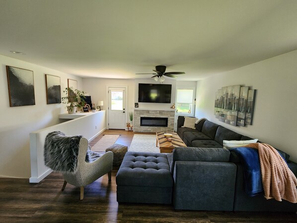 Smart TV, fireplace, DVD player, books