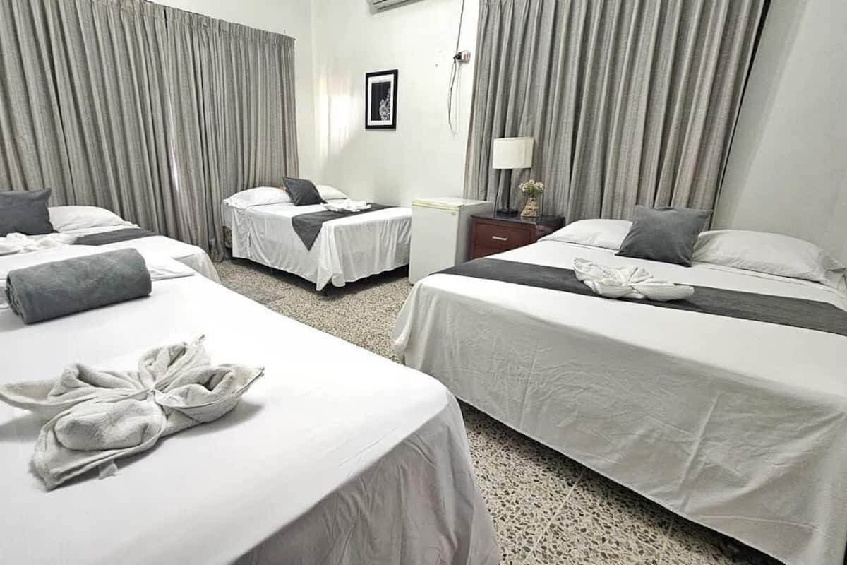 Basic Quadruple Room | In-room safe, desk, iron/ironing board, free WiFi