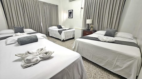 Basic Quadruple Room | In-room safe, desk, iron/ironing board, free WiFi