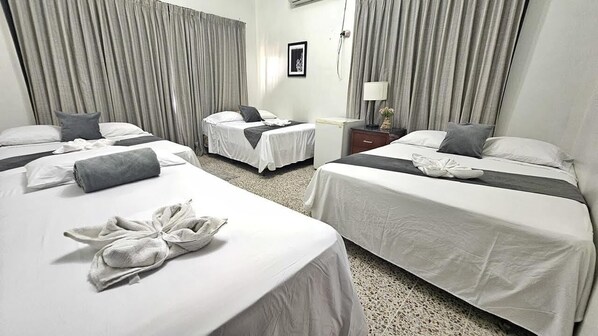 Basic Quadruple Room | In-room safe, desk, iron/ironing board, free WiFi