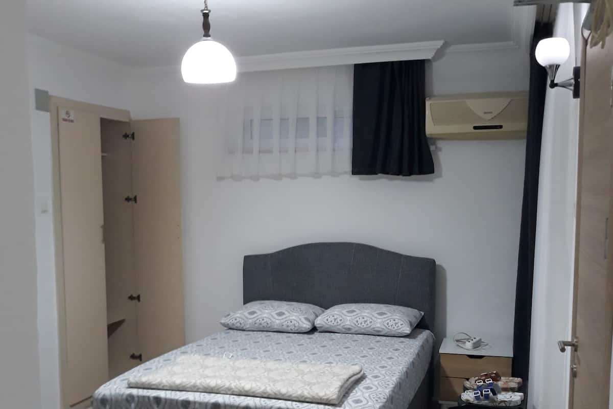 Comfort Apartment, Multiple Beds, Kitchen, Garden View | Laptop workspace, iron/ironing board