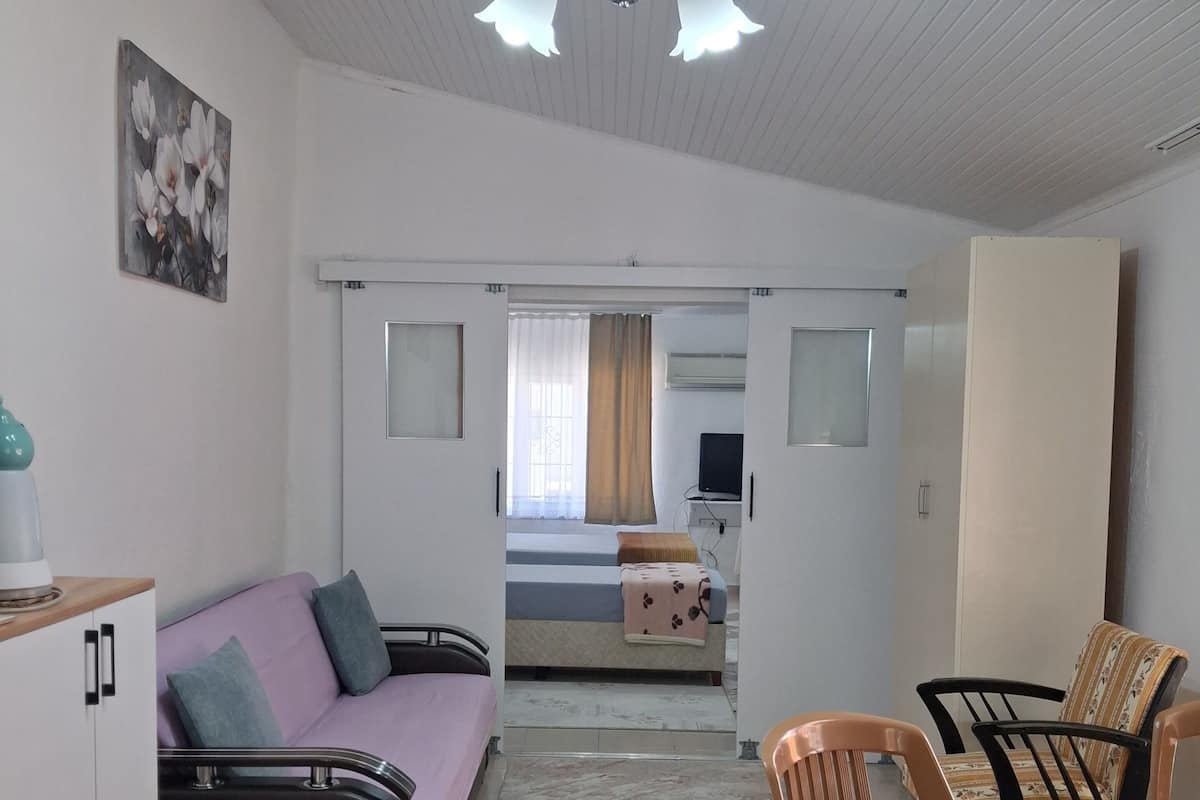 ห้องคอมฟอร์ทสำหรับสี่ท่าน, หลายเตียง, ลานระเบียง, วิวสวน | ครัวส่วนตัว