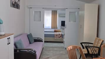 Firemannsrom – comfort, flere senger, terrasse, hageutsikt | Eget kjøkken