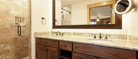 Shower, jetted tub, towels, soap