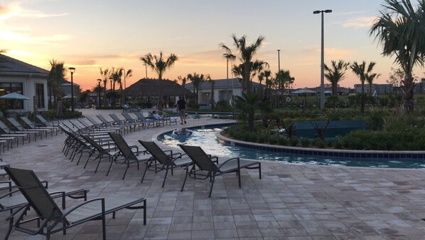 A heated pool - Nice and Cozy Townhome at Storey Lake Resort (Kissimmee)