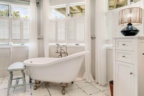 Shower, towels, soap, toilet paper