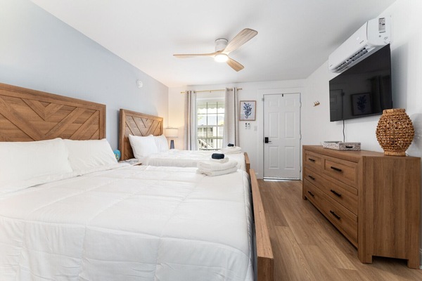 Bedroom with two full beds