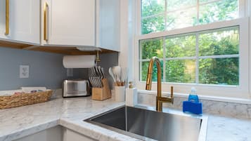 Fridge, microwave, stovetop, coffee/tea maker
