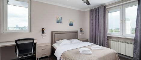 1 غرفة نوم ومكواة/لوح كي وواي فاي وملاءات أسرّة