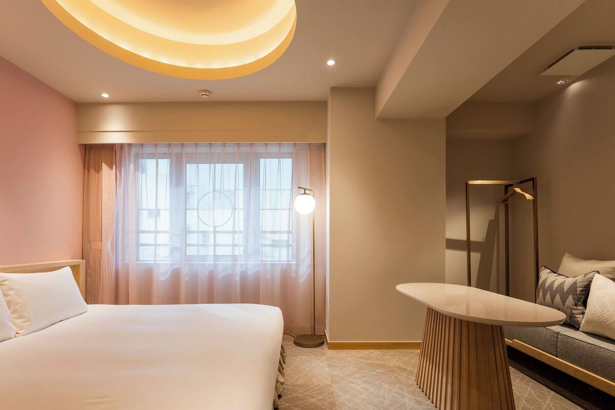 Standard Double Room | Down comforters, in-room safe, desk, blackout drapes