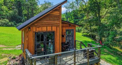 Tiny cabin sits by the bubbling, stocked creek. Pet friendly