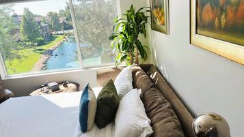 1 bedroom, desk, iron/ironing board, travel crib