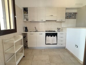Fridge, oven, dining tables