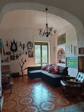 Interior. In the countryside, a cozy retreat for peaceful moments near Mount Vesuvius.