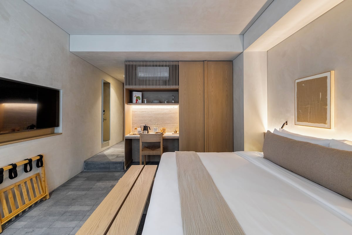 Superior Studio Suite, 1 King Bed, Balcony | Premium bedding, in-room safe, individually decorated