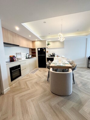 Fridge, microwave, oven, stovetop - Onsen Wellness Retreat (Khlong Tan Nuea Subdistrict)