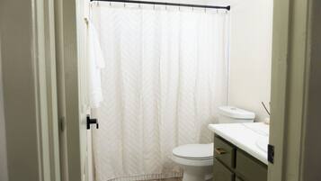 Hair dryer, towels, soap, toilet paper