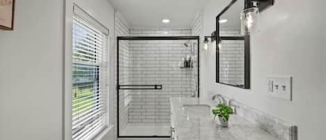 Shower, hair dryer, towels, soap