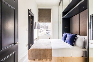 1 slaapkamer, een strijkplank/strijkijzer, wifi, beddengoed