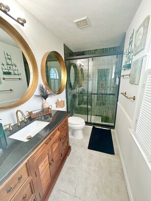 Shower, hair dryer, towels, soap