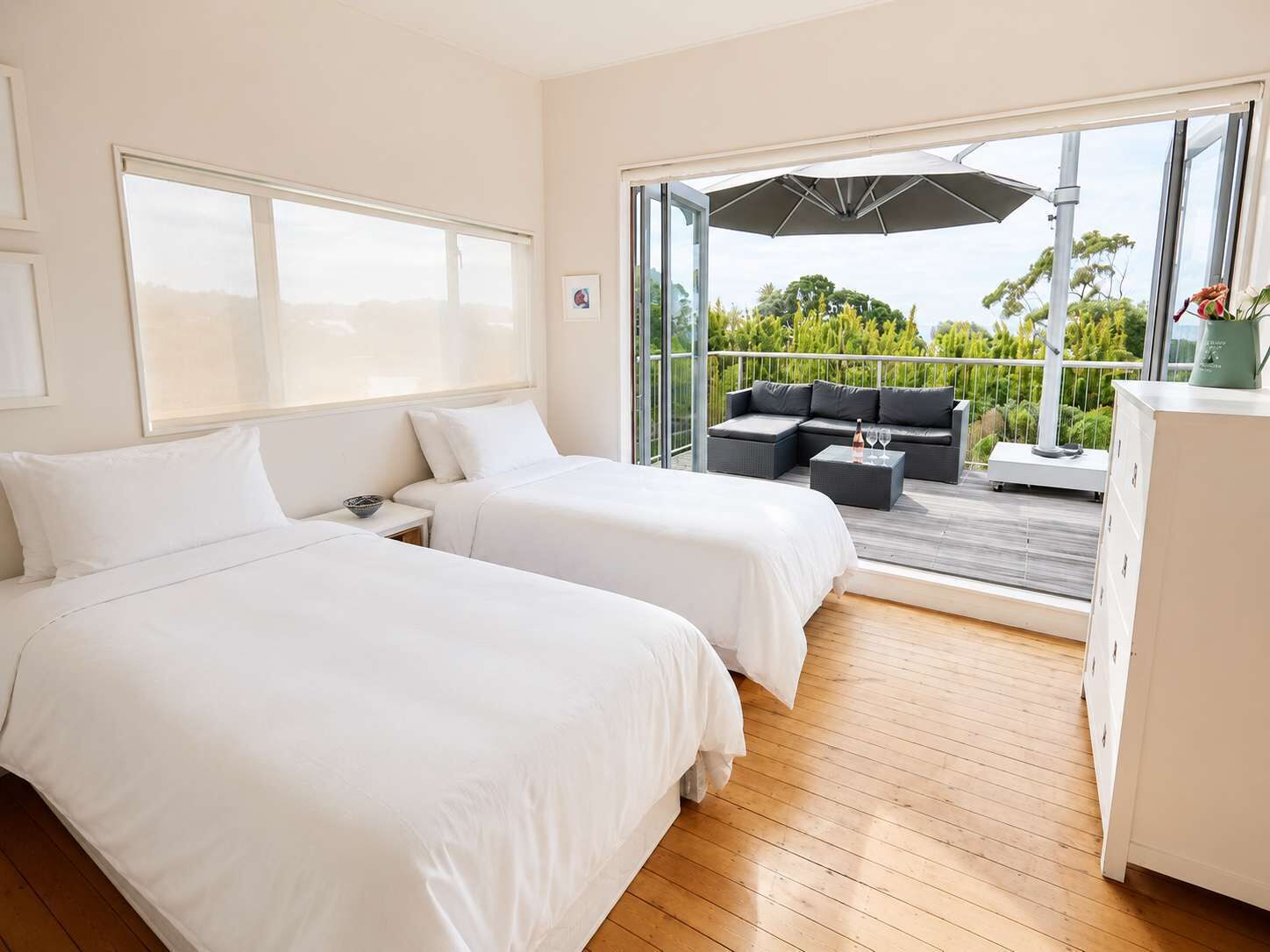 Bedroom 3 sits on the lop level and leads out to balcony 2