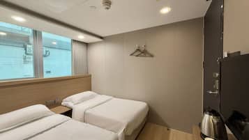 Classic Twin Room, City View | Blackout curtains, free WiFi