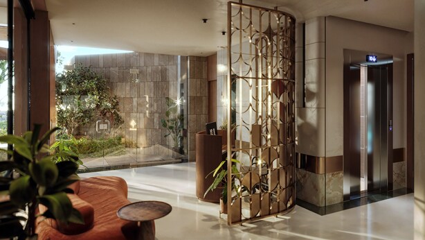 A modern lobby with a reception desk, a glass partition, and an elevator. - Magnolia Boutique Hue (Hue)