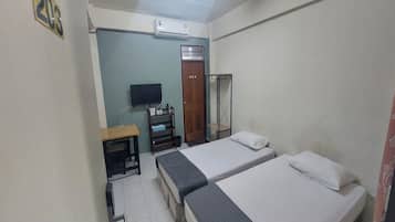 Habitación con 2 camas individuales | Wifi gratis y ropa de cama