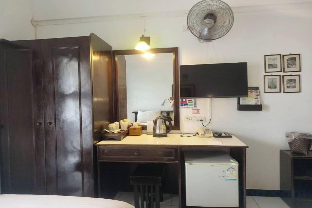 Desk, blackout drapes, rollaway beds (surcharge), WiFi (free)
